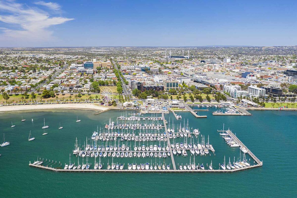 Aerial of Geelong looking over yachts in the bay towards the city